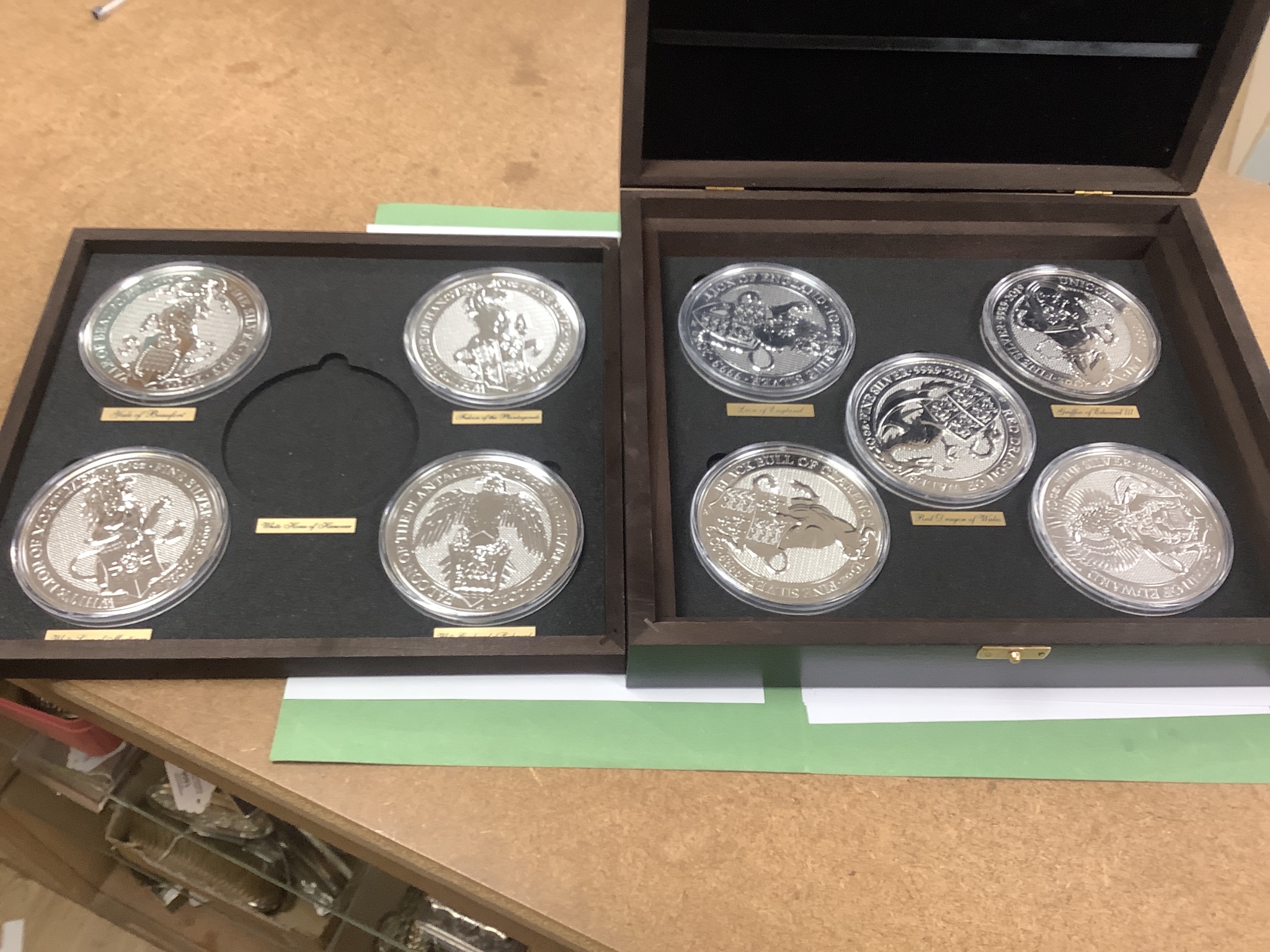 A cased part set of nine Queen's Beasts 10oz. bullion silver £10 coins, BU